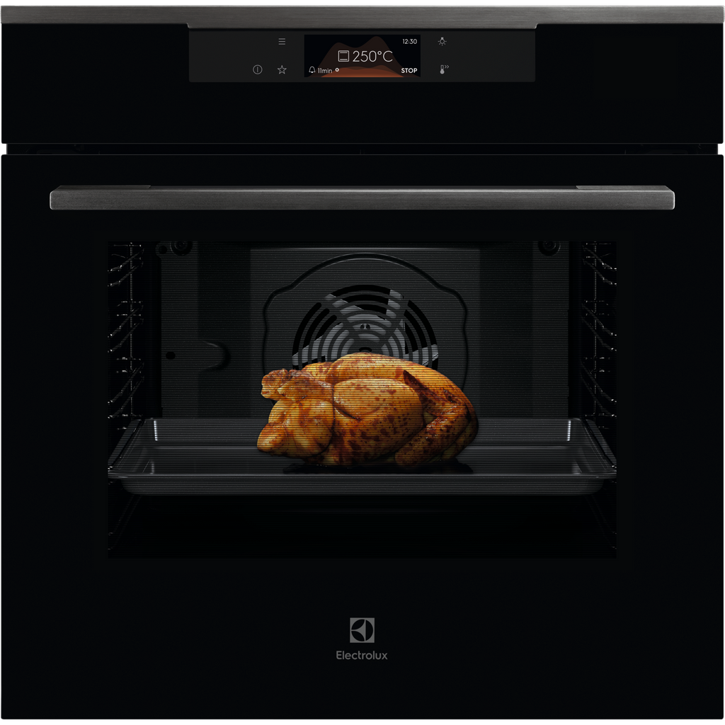 Electrolux KOFBC38H 60 cm 500 SurroundCook built-in single oven, 72 L, black glass front view with a roast chicken on a tray in the lit cavity