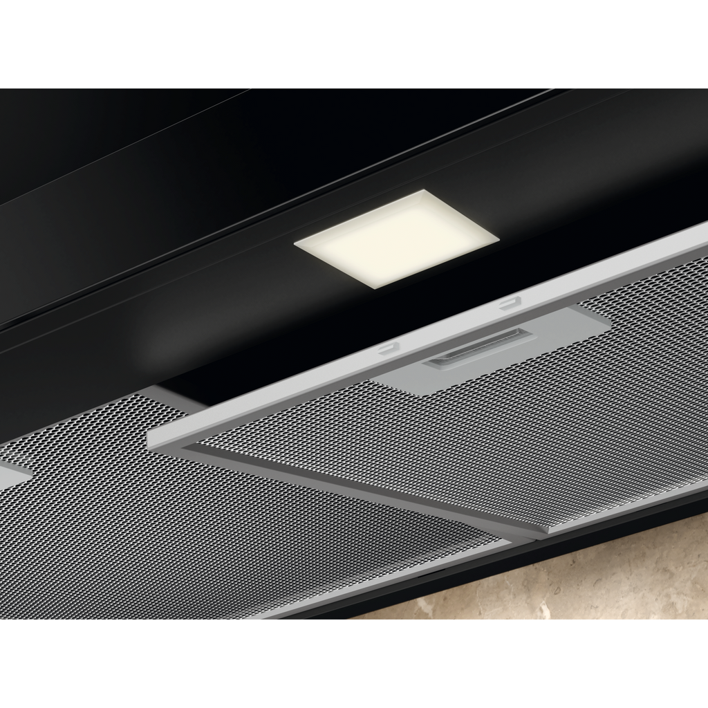 Electrolux ECT9633KB 90 cm 600 Series chimney extractor hood, underside close-up of an aluminium mesh grease filter and the LED light panel