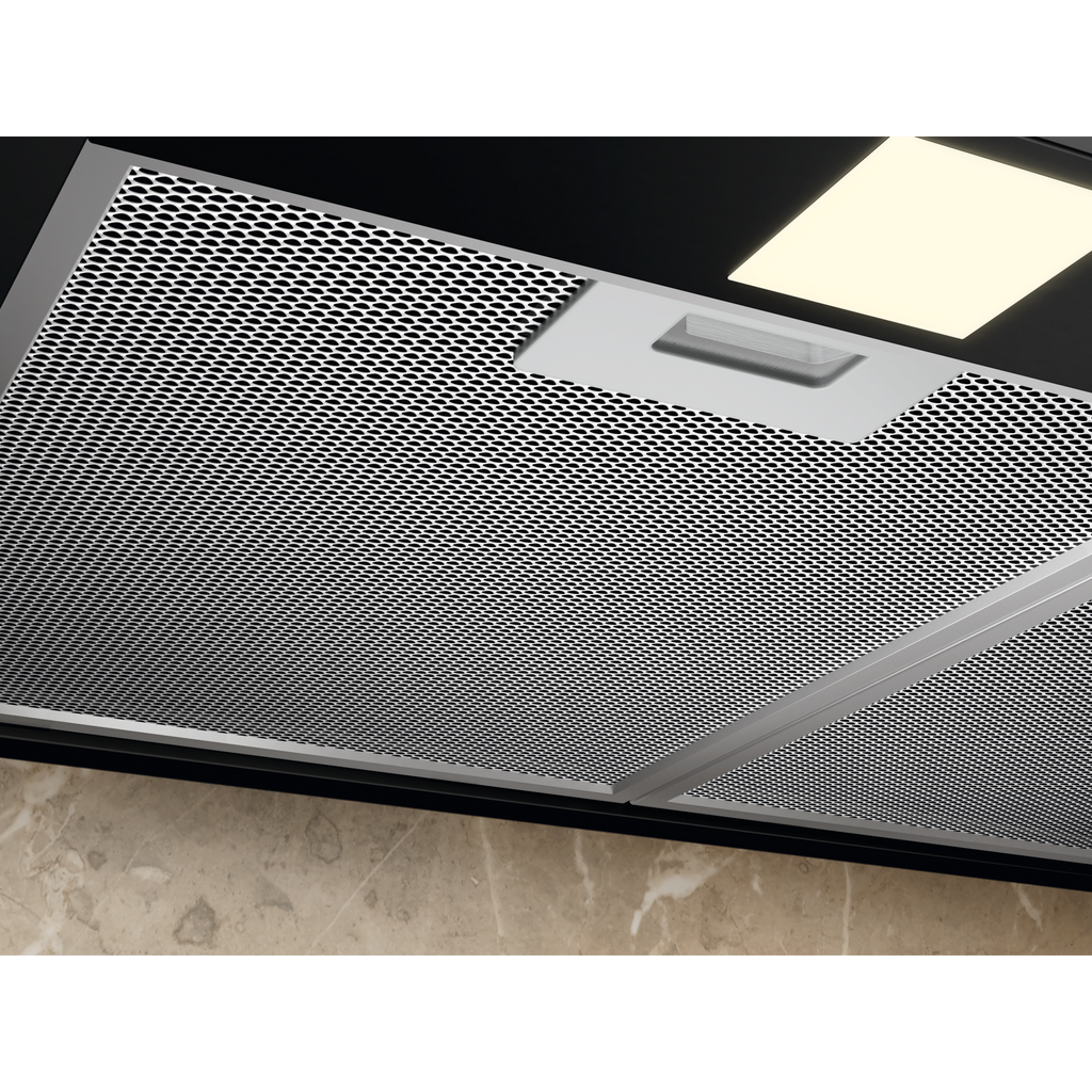 Electrolux ECT9633KB 90 cm 600 Series chimney extractor hood, underside view of a removable mesh grease filter with its pull tab and the LED light lit
