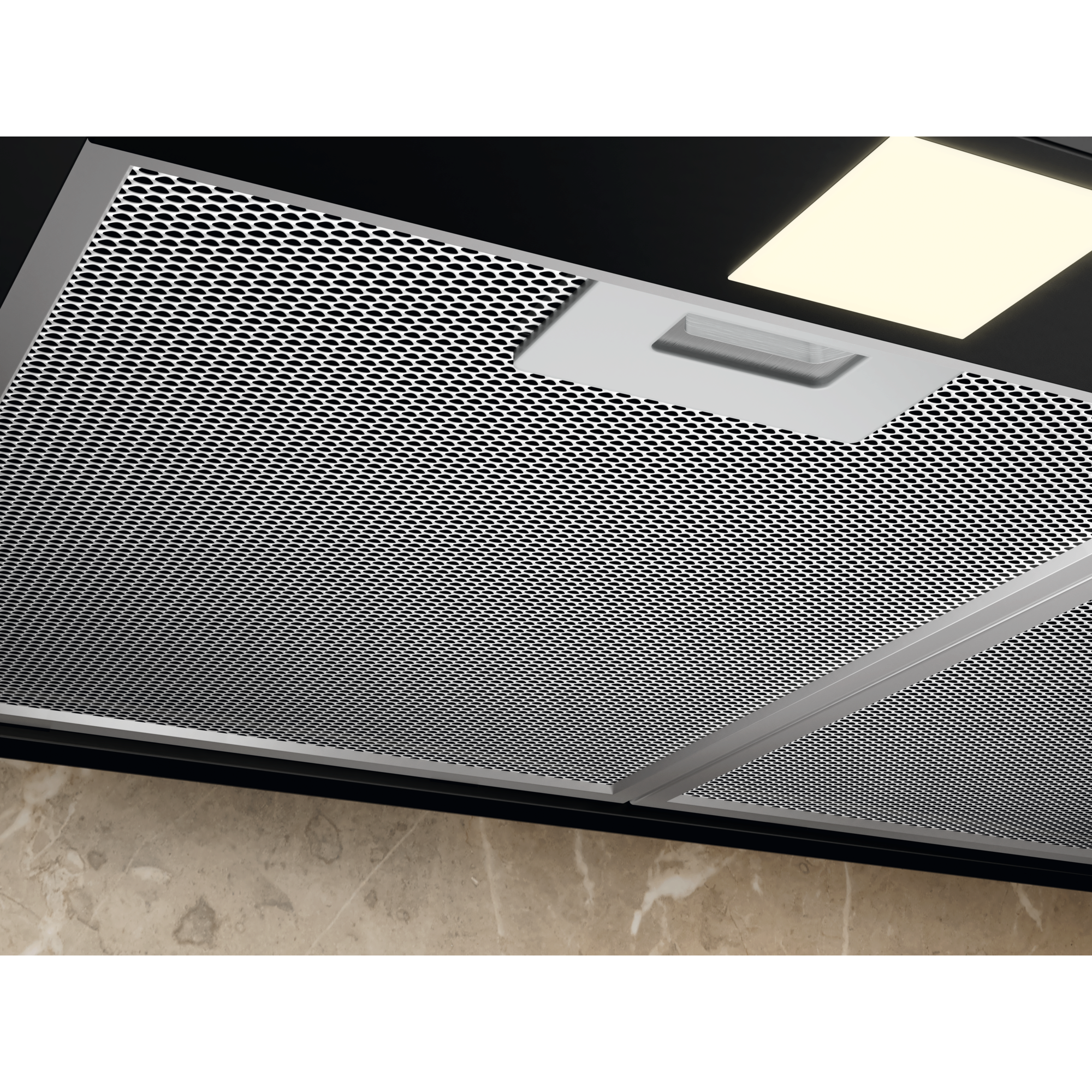 Electrolux ECT9633KB 90 cm 600 Series chimney extractor hood, underside view of a removable mesh grease filter with its pull tab and the LED light lit