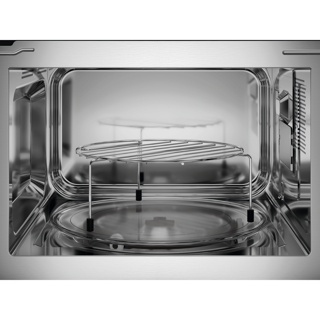 Electrolux EMFB25BG 600 Series built-in grill microwave oven, interior view with the wire grill rack standing on the glass turntable