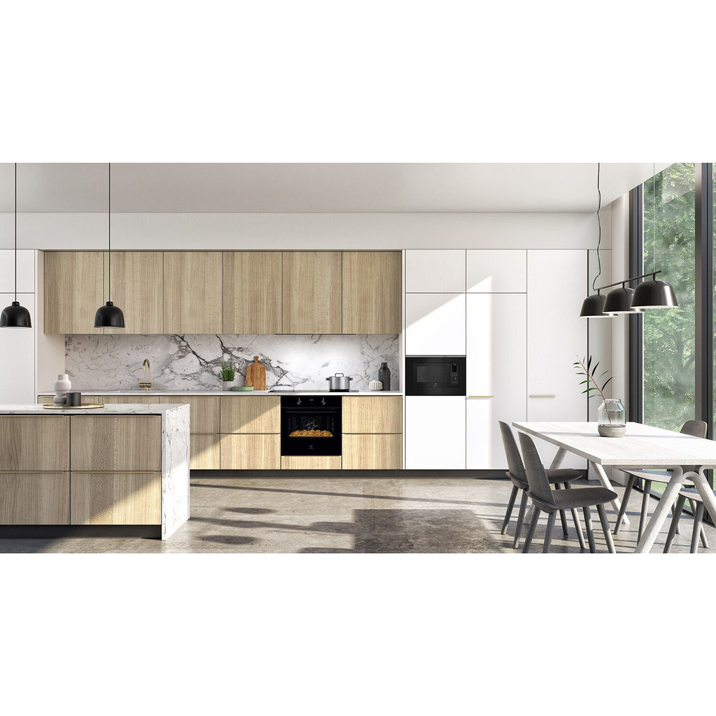 EMSB30XCF built-in combination microwave oven installed in a tall kitchen cabinet