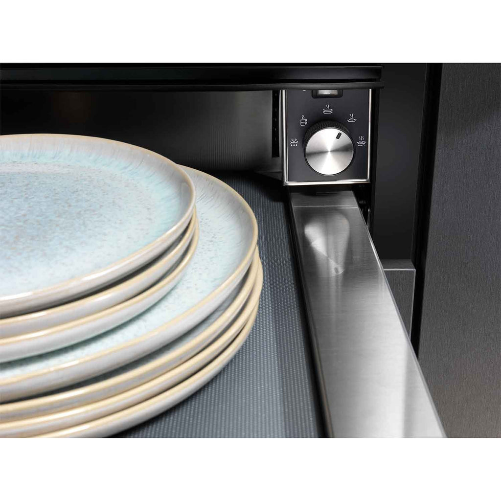 Electrolux KBD4X 60 cm UltimateTaste 700 built-in warming drawer, close-up of the stainless steel control knob with a stack of plates warming inside
